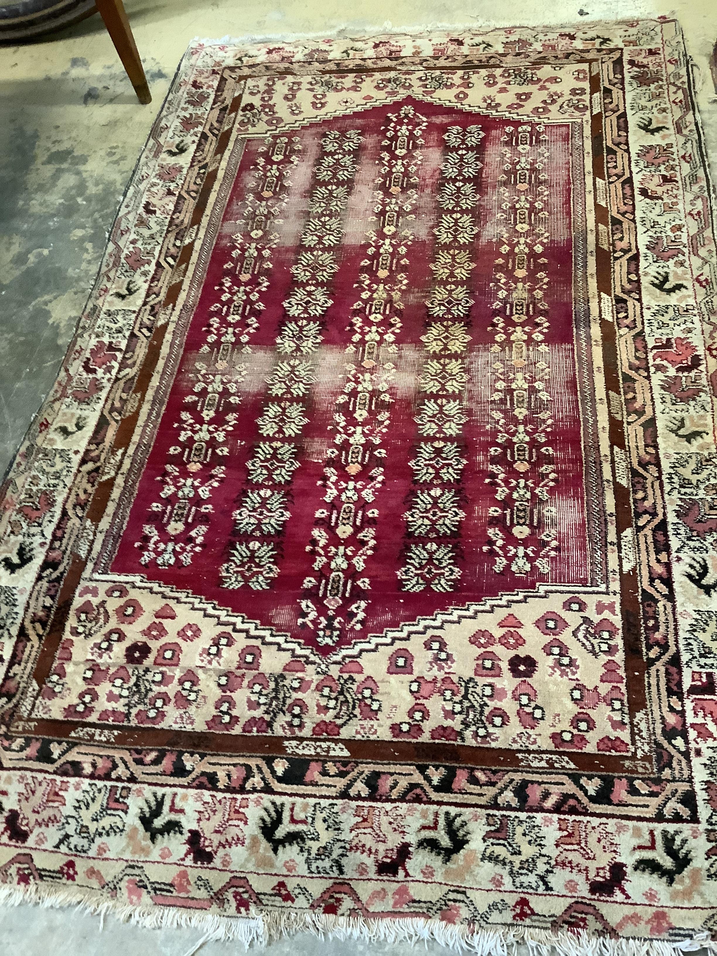 Two antique North West Persian blue ground rugs, a Turkish rug and a Belouch rug, largest 210 x 128cm